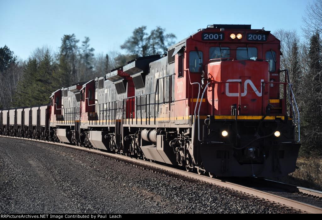 Ore loads roll east after making the turn